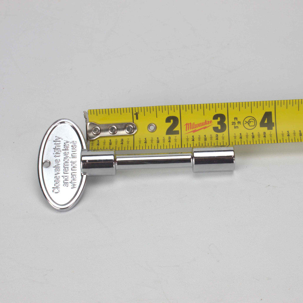 3" Key next to measuring tape