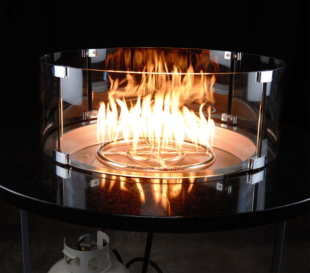 19" Round Propane fire pit and flames protected by a 23" round flame guard.