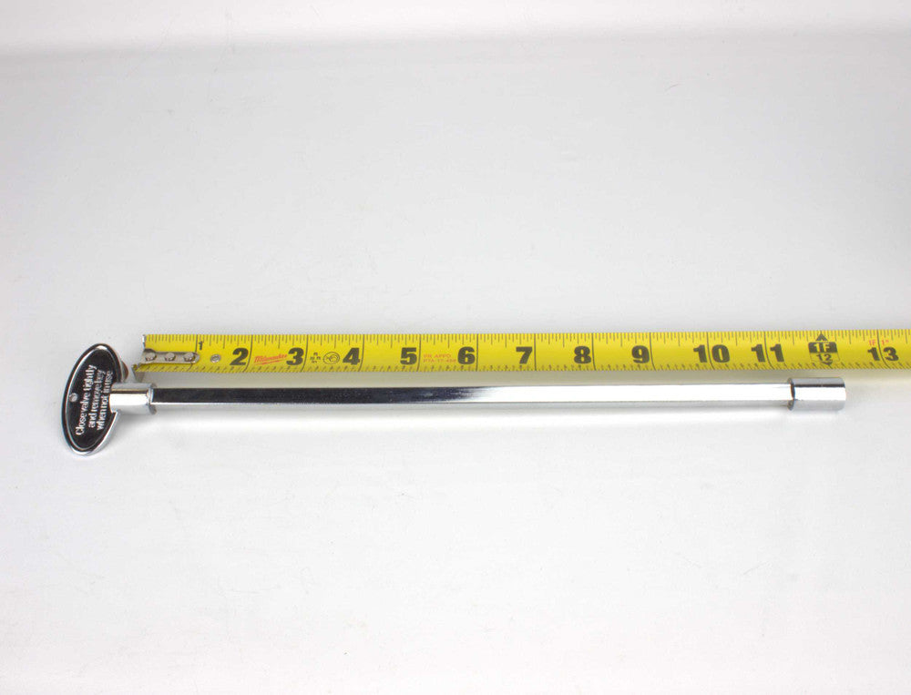 12" Universal Gas Valve Key next to measuring tape