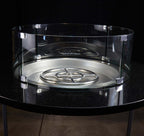 Our 8 inch tall 23" round flame guard around a 19" Round Burner Pan