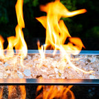 Are those flames dancing across a bed of gold pieces?-- No, it's Sunstorm Gold Reflective Tempered Fire Glass!